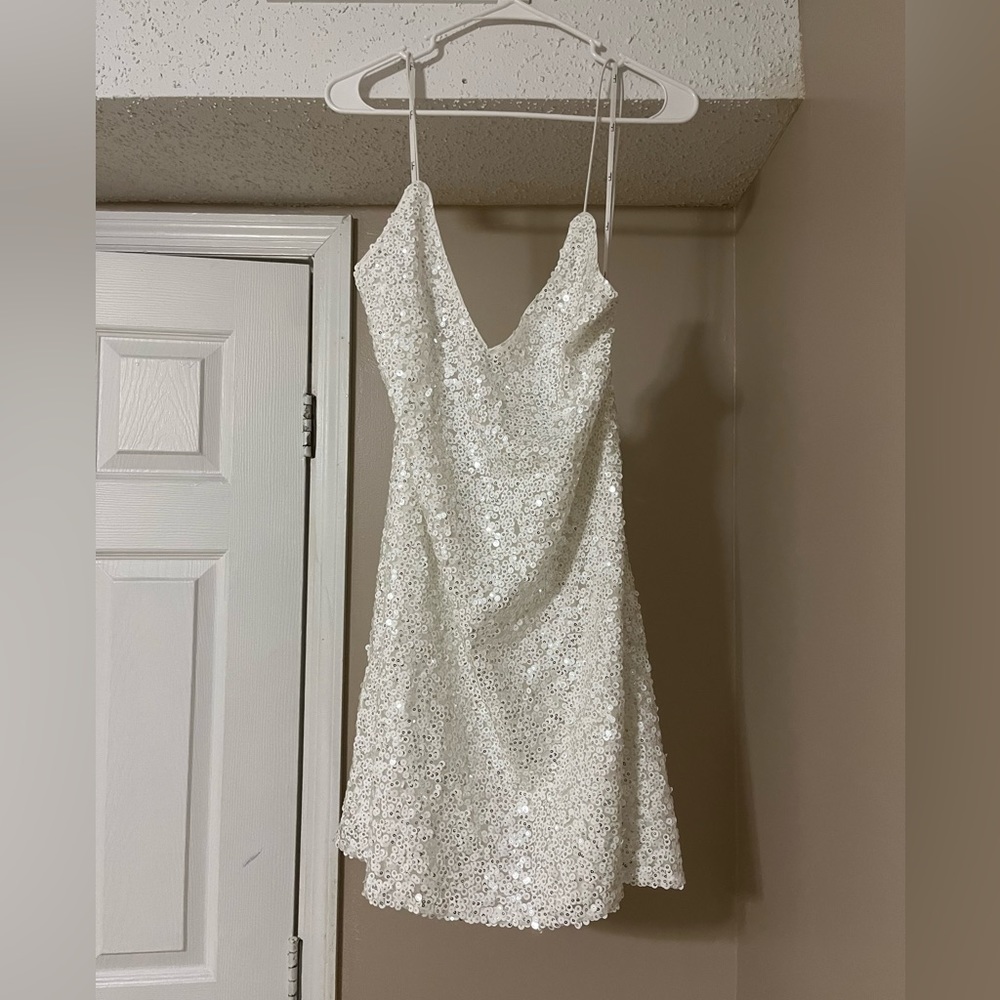 Lulu’s Force of Fashion White Backless Sequence Mini Dress